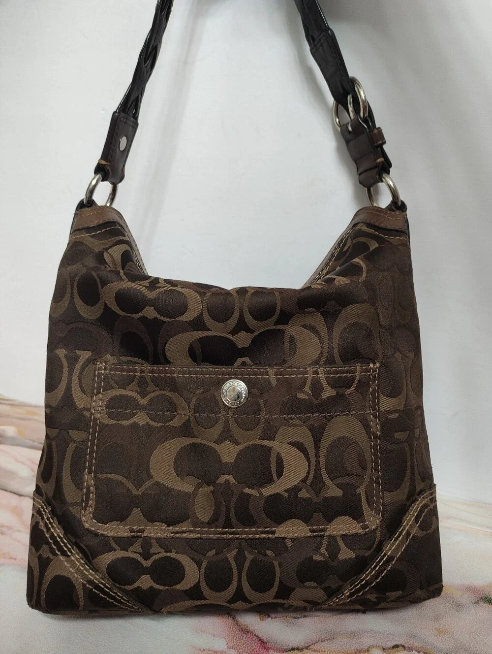 Coach signature fabric